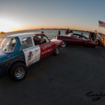 nostalgic race car, tow truck, american flag, sunset, finned valve cover, chrome, www, wide whites, fools goldster, riverview lodge, chevy kustom, Scotto, Scott Strickland