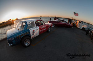 nostalgic race car, tow truck, american flag, sunset, finned valve cover, chrome, www, wide whites, fools goldster, riverview lodge, chevy kustom, Scotto, Scott Strickland