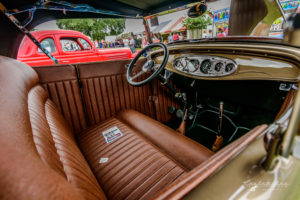 1932, 32, Roadster, ford, soft top, removable top, hot rod, big n' littles, chrome, paint, smooth, park, sky, clouds, car show, NSRA UK, K. Mikael Wallin, Customikes, passenger side interior view, brown succulent leather, pleated, traditional, dash, dashboard, gauges, steering wheel, 