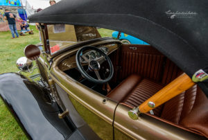 Interior, blood red, red, wood bow, mirror, steering wheel, fender, driver side interior view, 1932, 32, Roadster, ford, soft top, removable top, hot rod, big n' littles, chrome, paint, smooth, park, sky, clouds, car show, NSRA UK, K. Mikael Wallin, Customikes